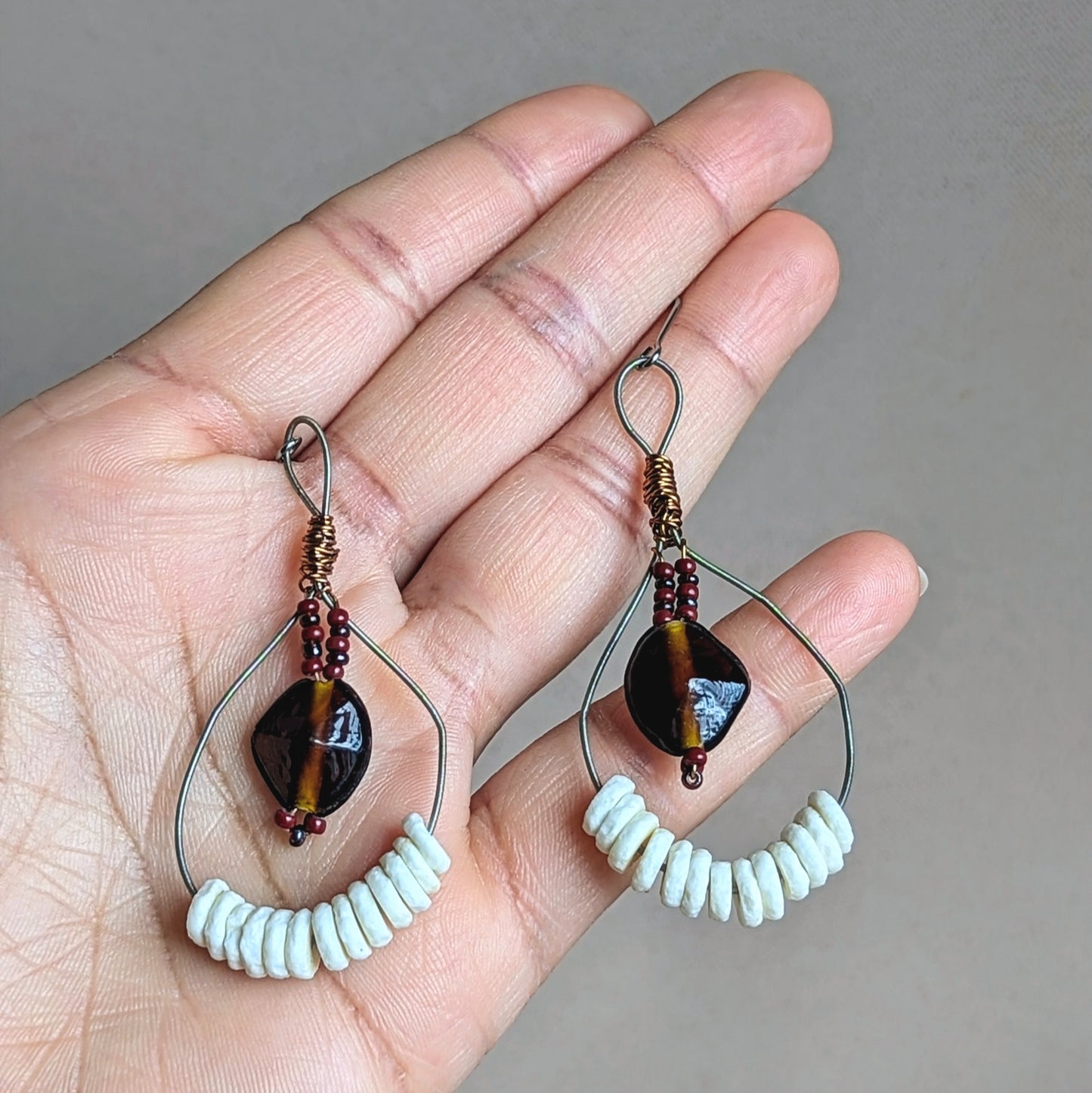 Exceptionally lightweight luxurious artisan handcrafted African tribal jewellery inspired earrings featuring high quality upcycled elements for a sustainable statement you can make with style by UK Indian jewellery designer maker Megha of Mayaani Jewellery UK.