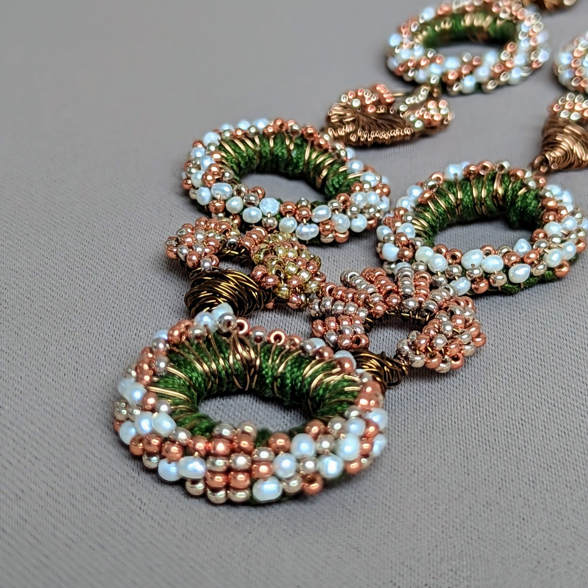 Intricate Artisan Handcrafted Pearl, Green, Gold & Bronze Statement Indian Inspired Necklace by Sustainable UK Brand Mayaani Jewellery & Indian Designer Maker Megha.