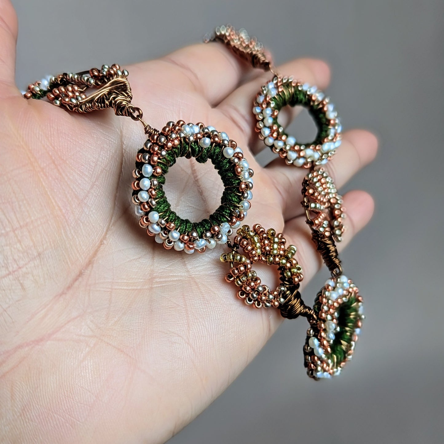 Freshwater Pearls, Green Crochet and Hand Wire Wrapping With Gold and Rose Gold Beads Come Together in this Statement OOAK Handcrafted Indian Inspired Necklace by Mayaani Jewellery UK.