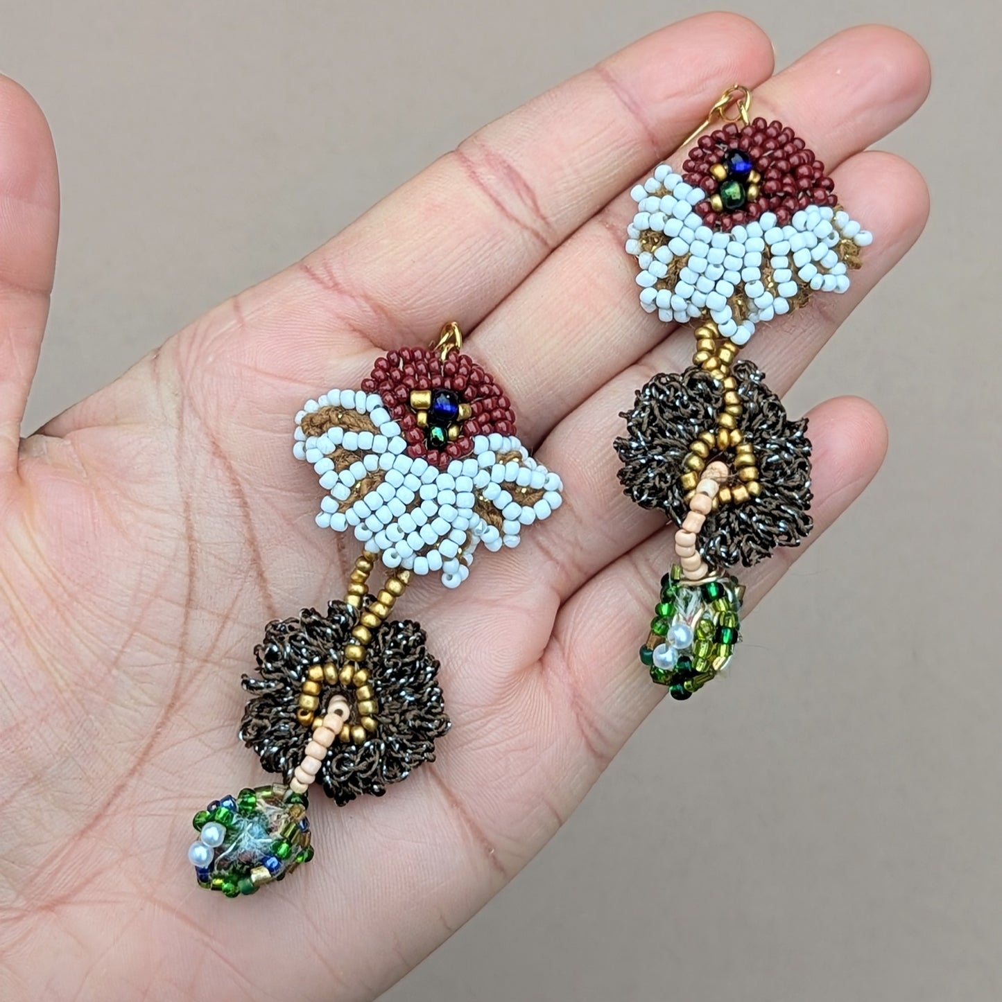 Enjoy long hours of comfort in this exceptionally handcrafted lightweight pair of statement Indian inspired earrings by Mayaani Jewellery UK. Featuring beads made out of the waste produced from the jewellery making process, they stand true to the brand's commitment to sustainability.